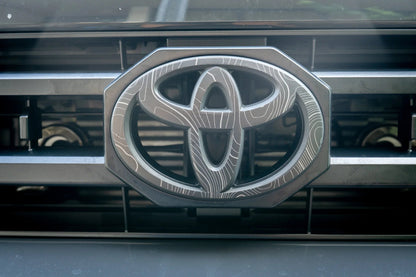 Front OEM Cover Topographic Overlays - *2024+ Tacoma / *2025+ 4Runner