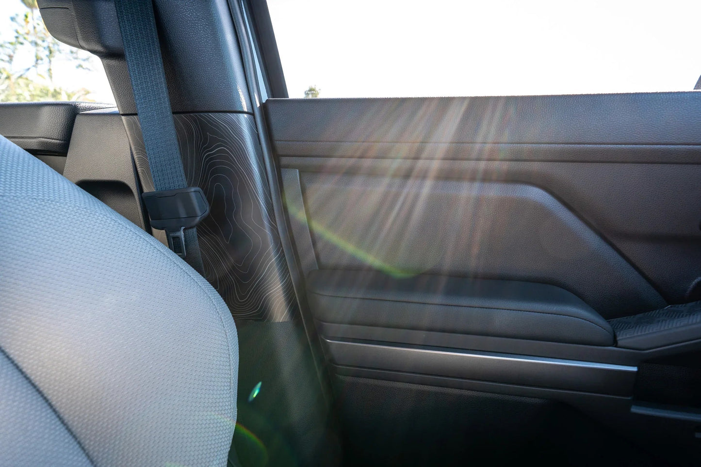 Topographic Seatbelt Panel Protection - 2024+ Tacoma / 2025+ 4Runner